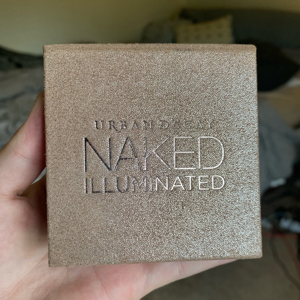 Urban Decay NAKED ILLUMINATED Highlighter with brush included.